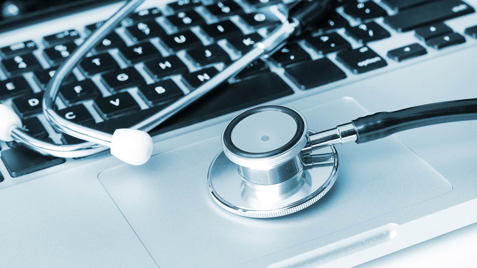 Stethoscope on a laptop computer